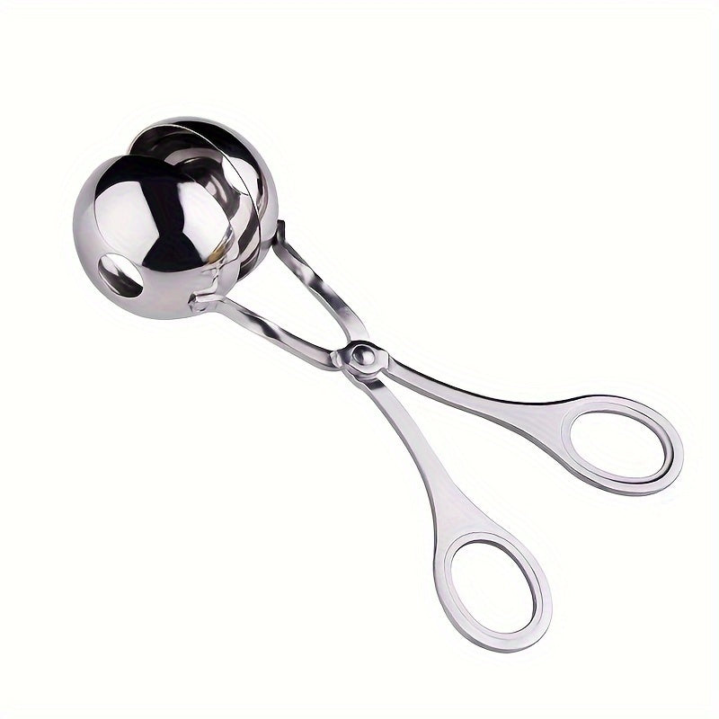 Stainless steel meatball press with non-slip handle.