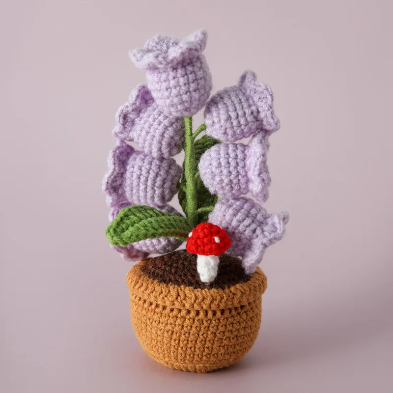 Knitted lily of the valley with LED light.