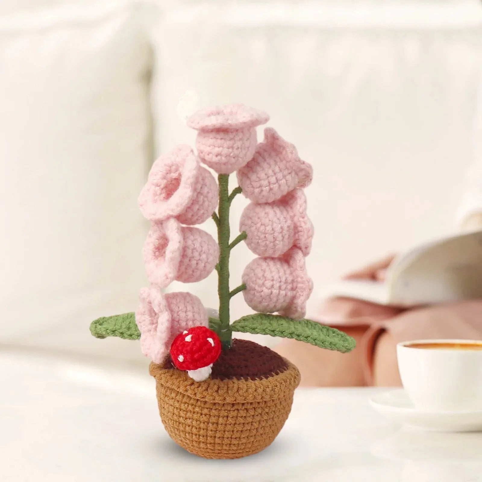 Knitted lily of the valley with LED light.